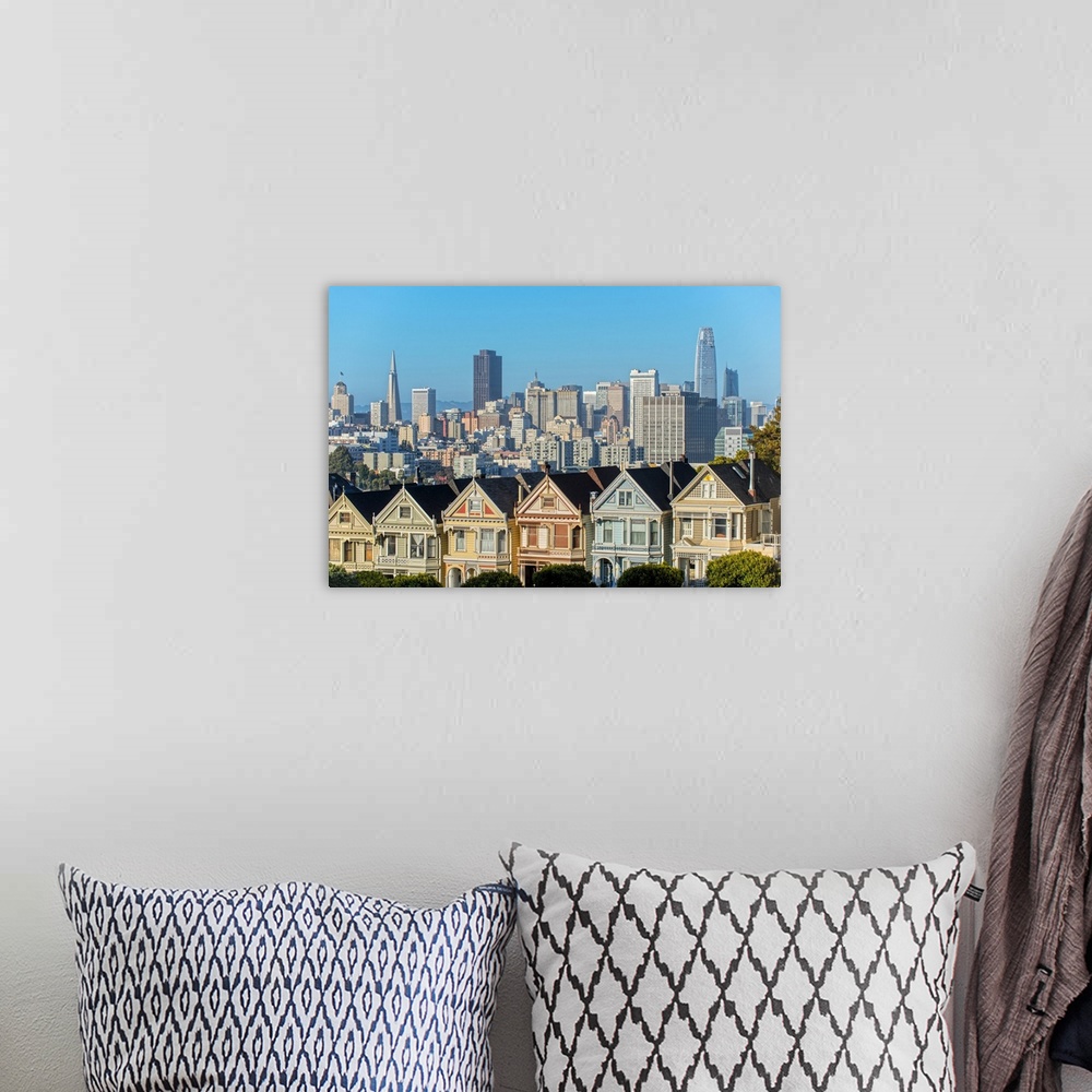 A bohemian room featuring Photograph of the Painted Ladies in downtown San Francisco with tall buildings in the background.