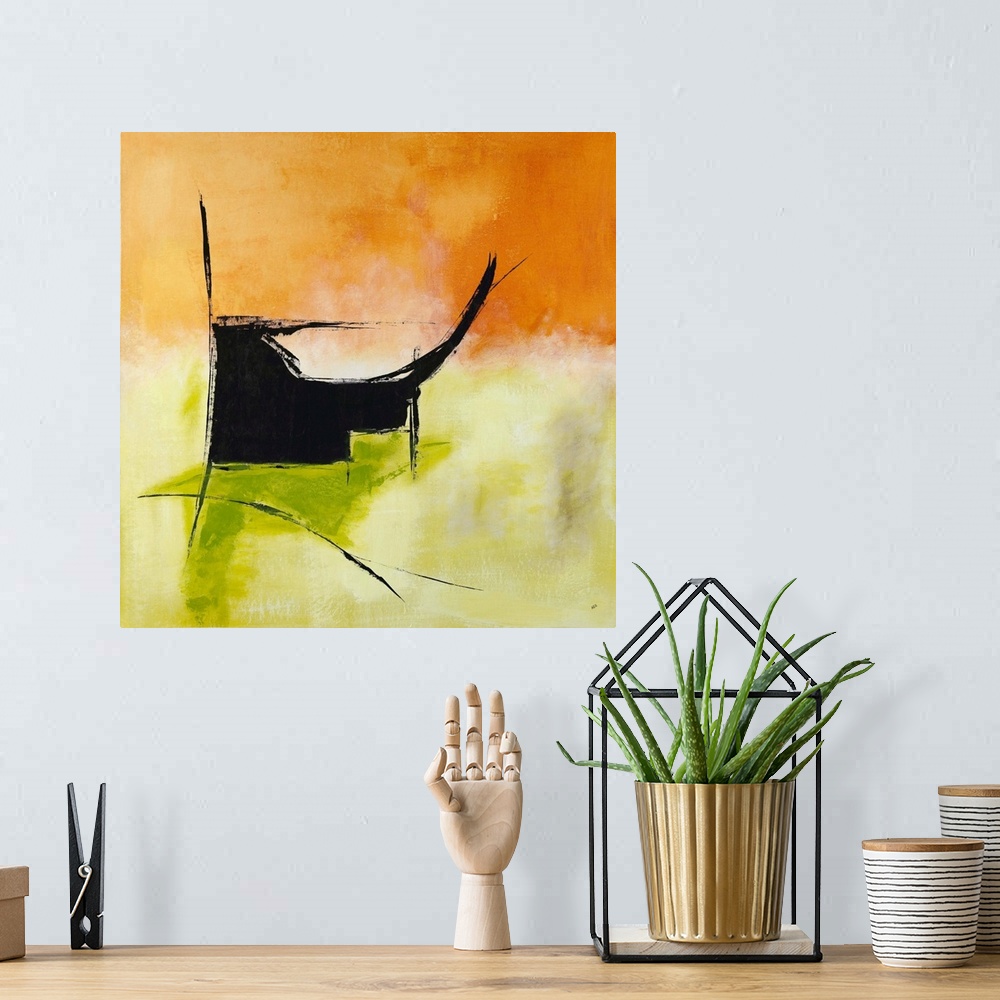 A bohemian room featuring Square abstract painting in bright orange and green hues with a black design.