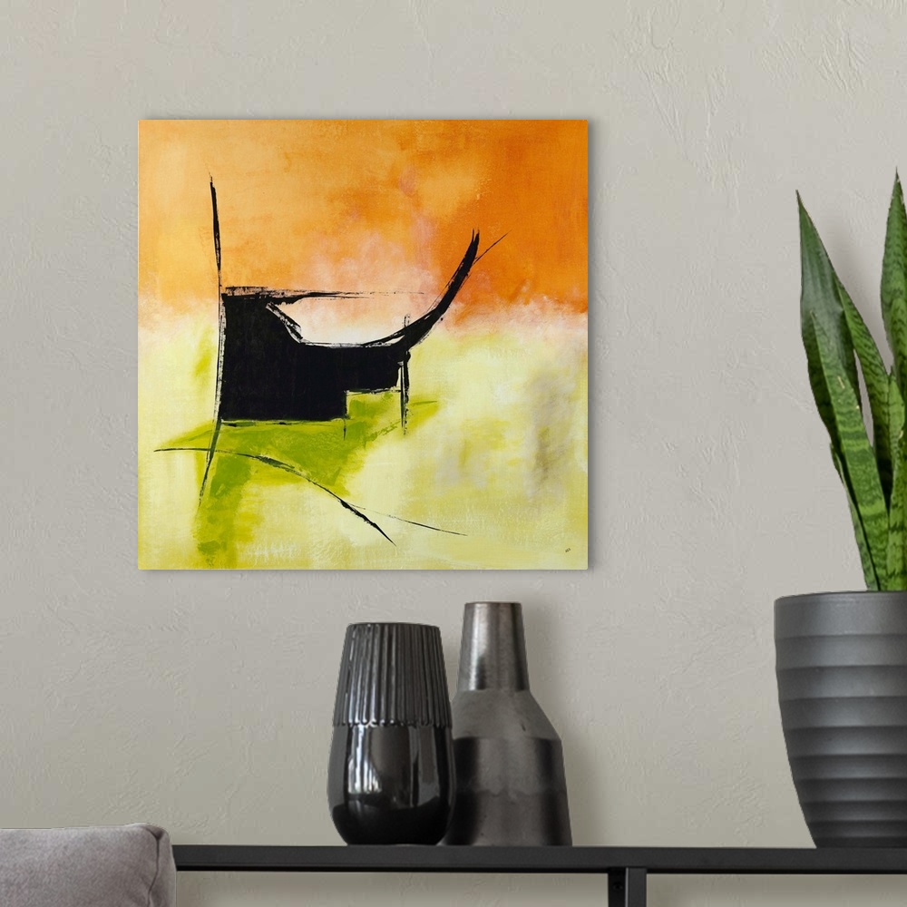 A modern room featuring Square abstract painting in bright orange and green hues with a black design.