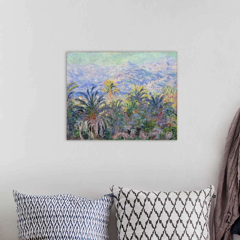 A bohemian room featuring This canvas, like?The Valley of the Nervia, was painted during Monet's trip to the Italian Rivier...