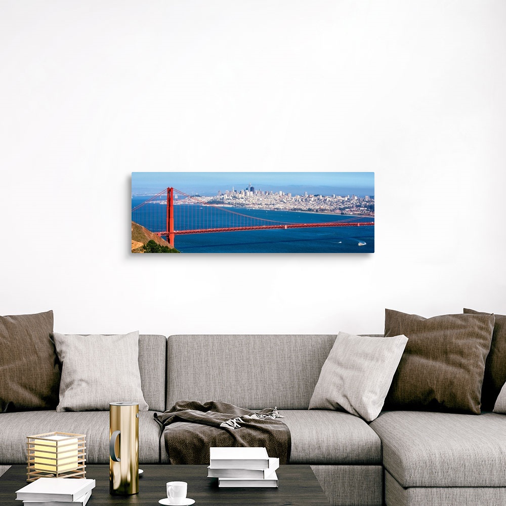 A traditional room featuring Panoramic photograph of the Golden Gate Bridge with San Francisco's skyscrapers in the background.