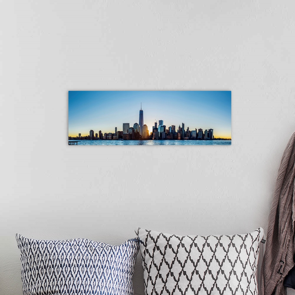 A bohemian room featuring View of the New York City skyline in the morning from across the Hudson River.