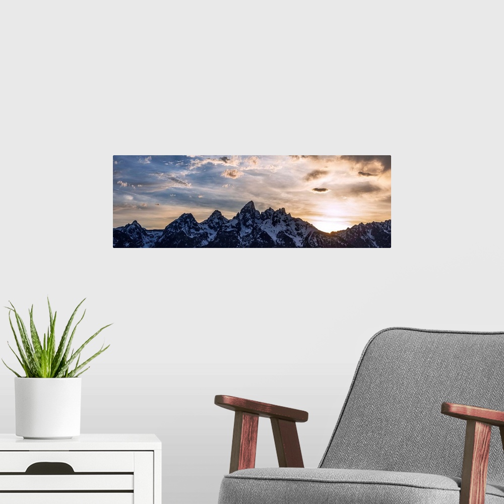 A modern room featuring Panoramic view of Teton mountains in the morning in Wyoming.