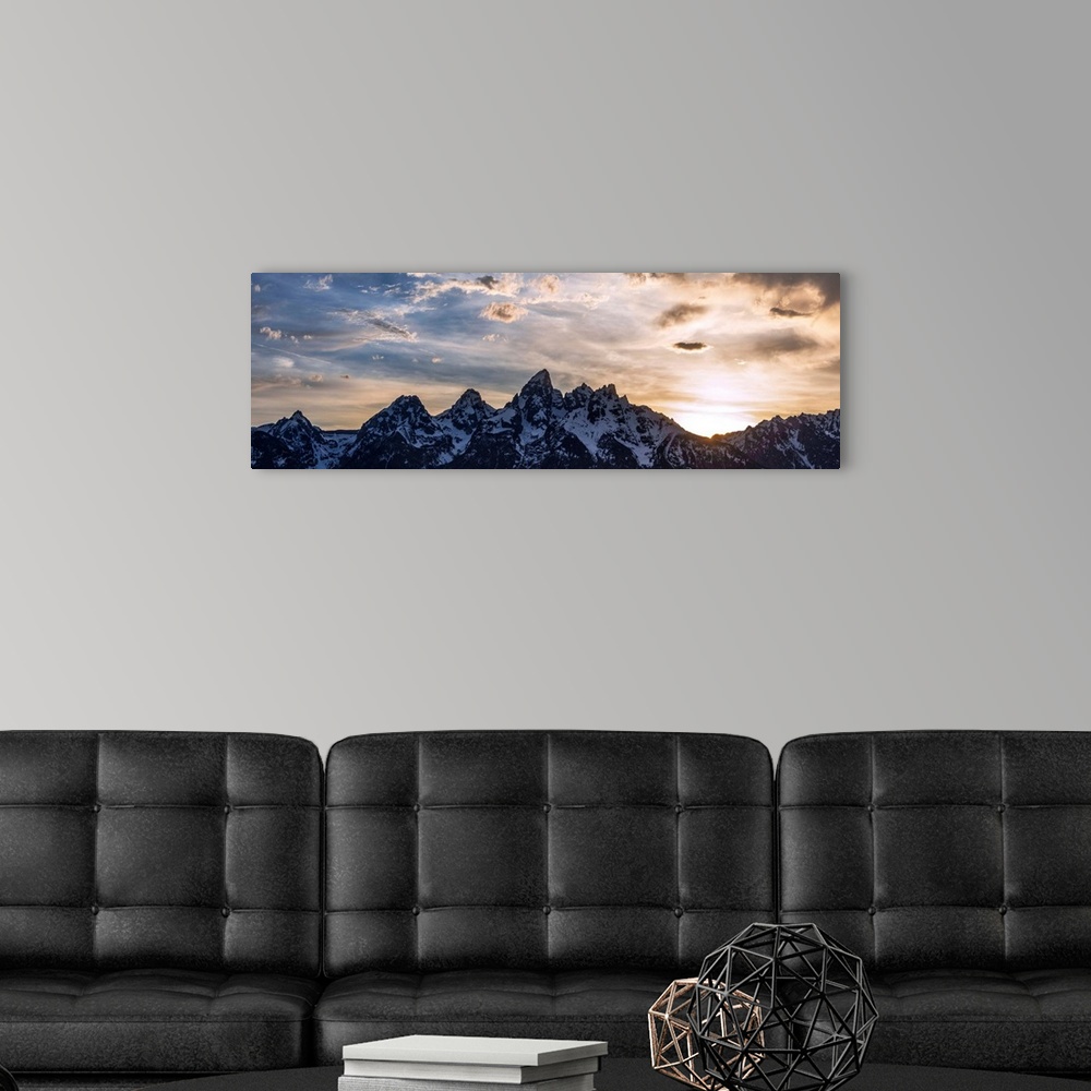 A modern room featuring Panoramic view of Teton mountains in the morning in Wyoming.