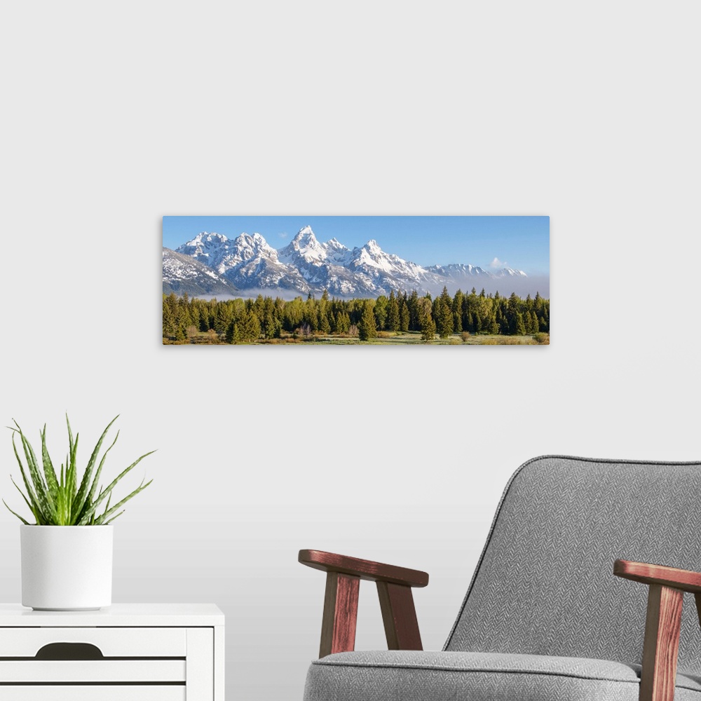 A modern room featuring View of the Middle Teton, Grand Teton and Mount Owen In Grand Teton National Park, Wyoming.