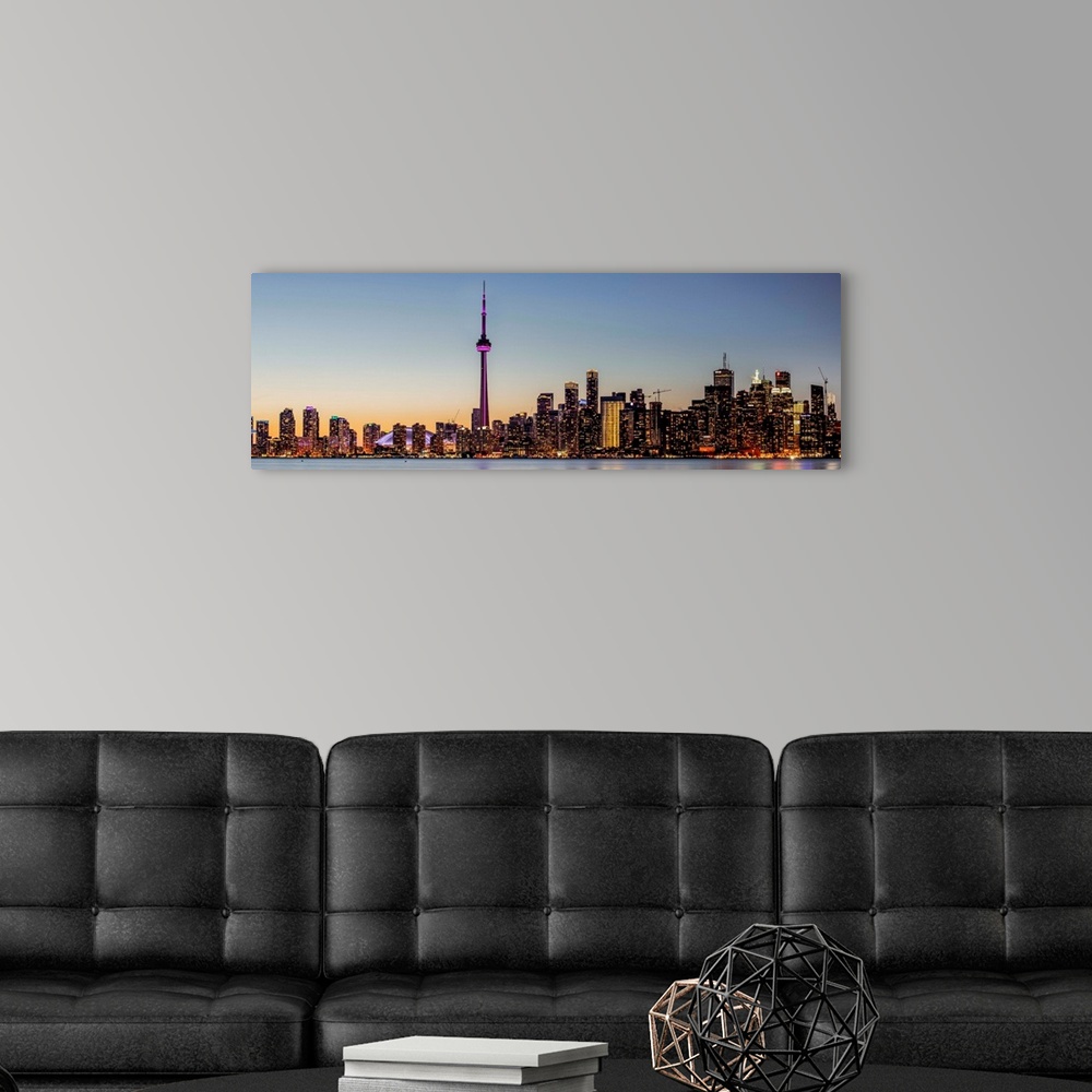 A modern room featuring Photo of Toronto city skyline at night, Ontario, Canada.