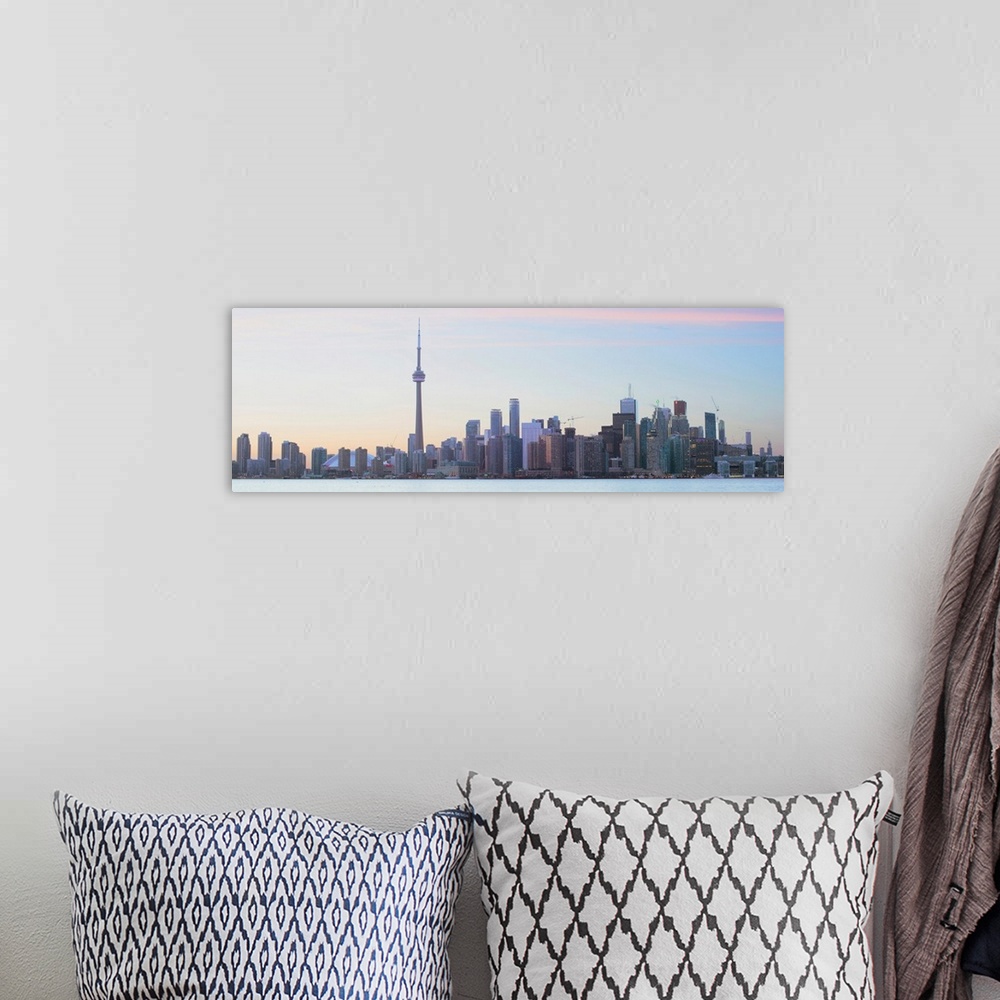 A bohemian room featuring Panoramic photo of Toronto city skyline under a blue sky, Ontario, Canada.