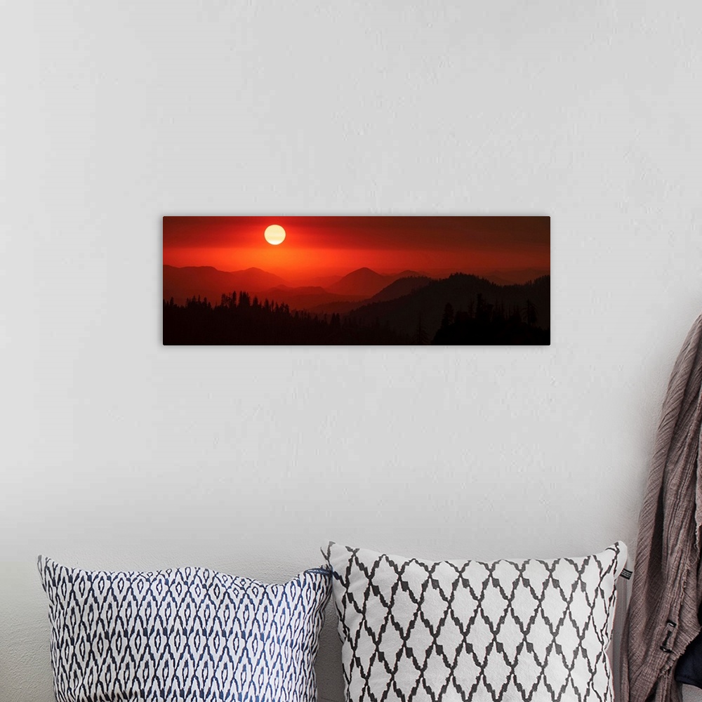 A bohemian room featuring Panoramic view of a darkened red sky in Sequoia National Park, California.