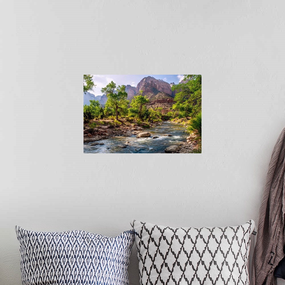 A bohemian room featuring View of a Pa'rus trail bridge over Virgin River with 'The Streaked Wall' in the background in Zio...