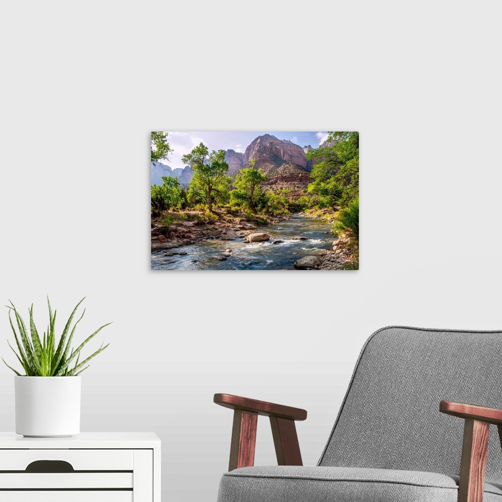 A modern room featuring View of a Pa'rus trail bridge over Virgin River with 'The Streaked Wall' in the background in Zio...