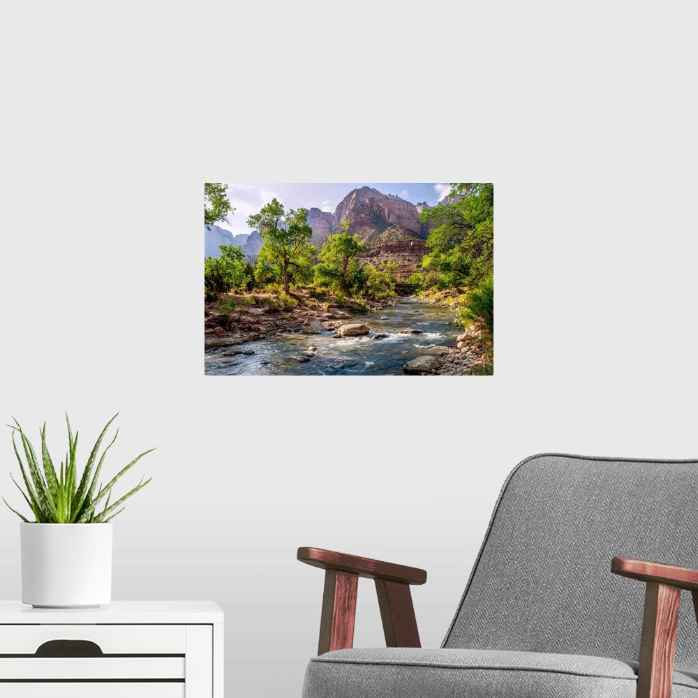 A modern room featuring View of a Pa'rus trail bridge over Virgin River with 'The Streaked Wall' in the background in Zio...