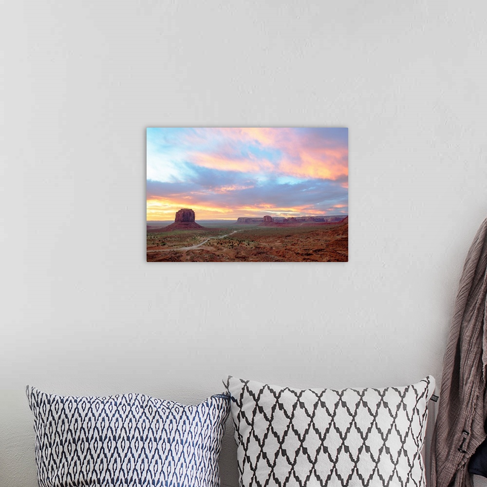 A bohemian room featuring Pastel Sunrise over Merrick Butte and John Ford Point in Monument Valley, Arizona.