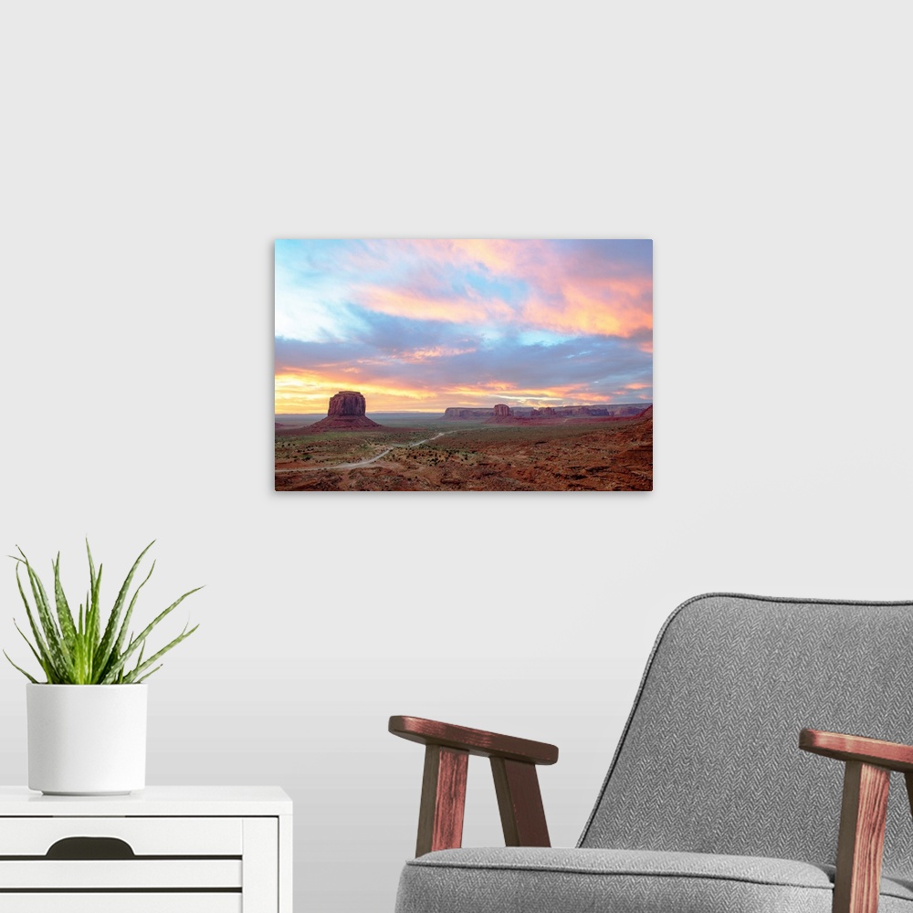 A modern room featuring Pastel Sunrise over Merrick Butte and John Ford Point in Monument Valley, Arizona.