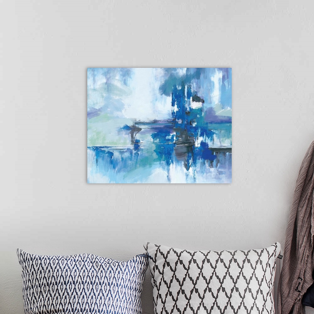 A bohemian room featuring A contemporary abstract painting using multiple blue tones in a horizontal movement.