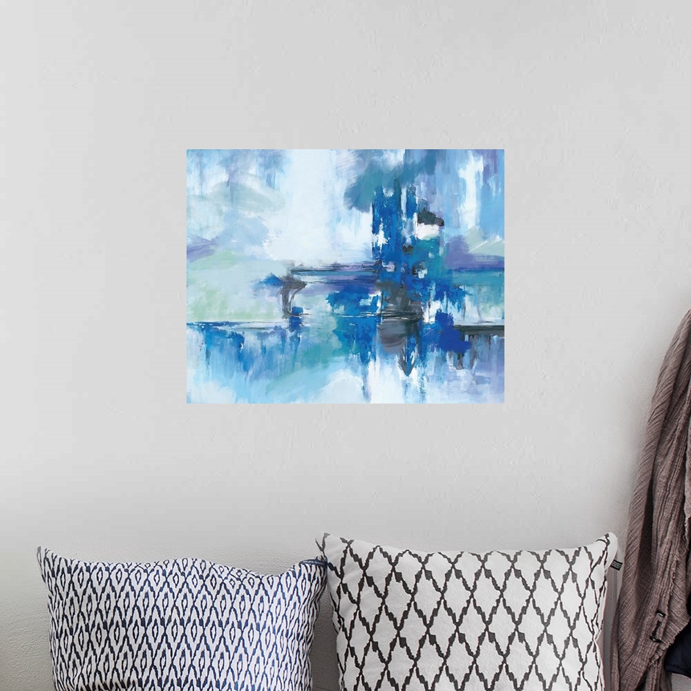 A bohemian room featuring A contemporary abstract painting using multiple blue tones in a horizontal movement.