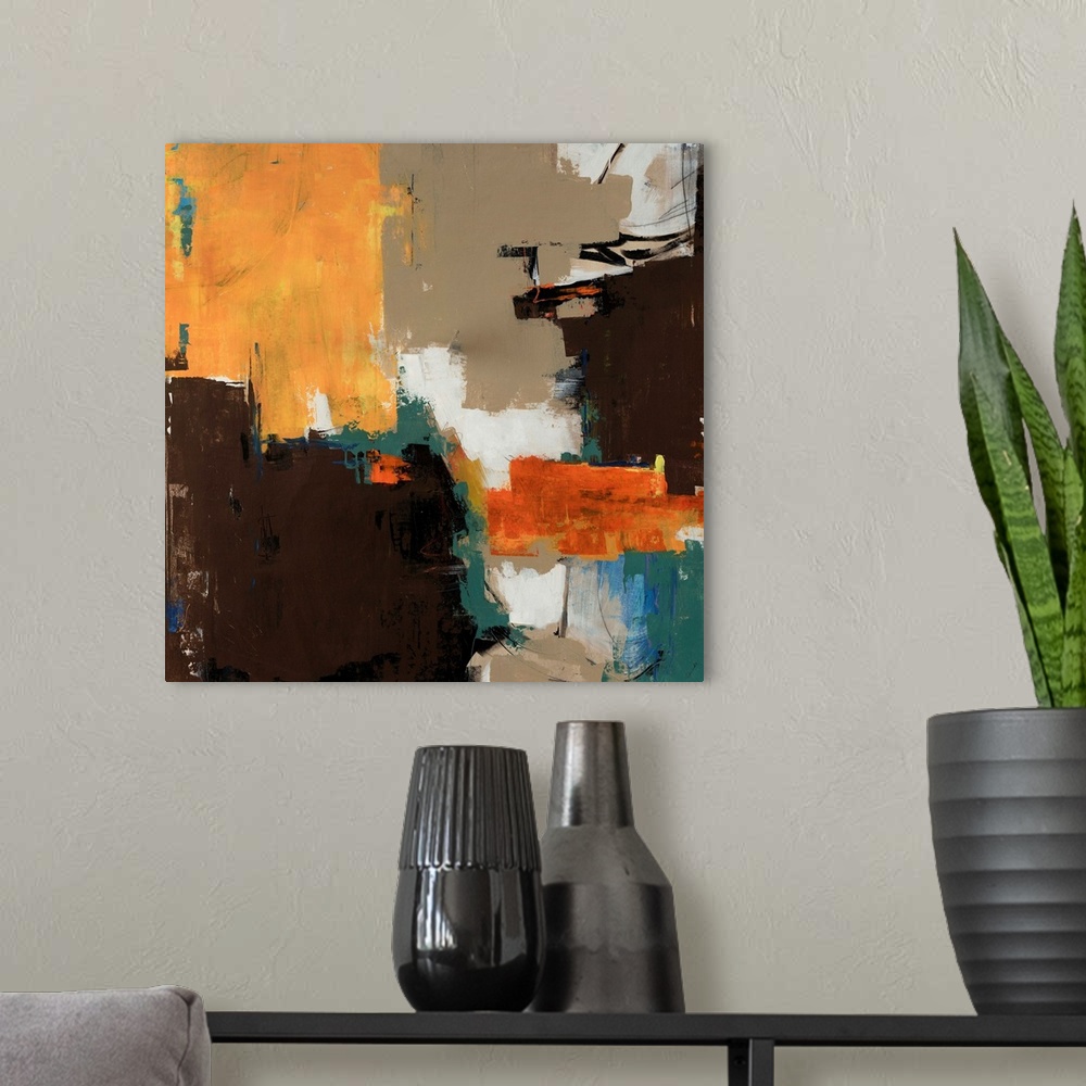 A modern room featuring Abstractly painted image on canvas with different patches of color layered on top of each other.