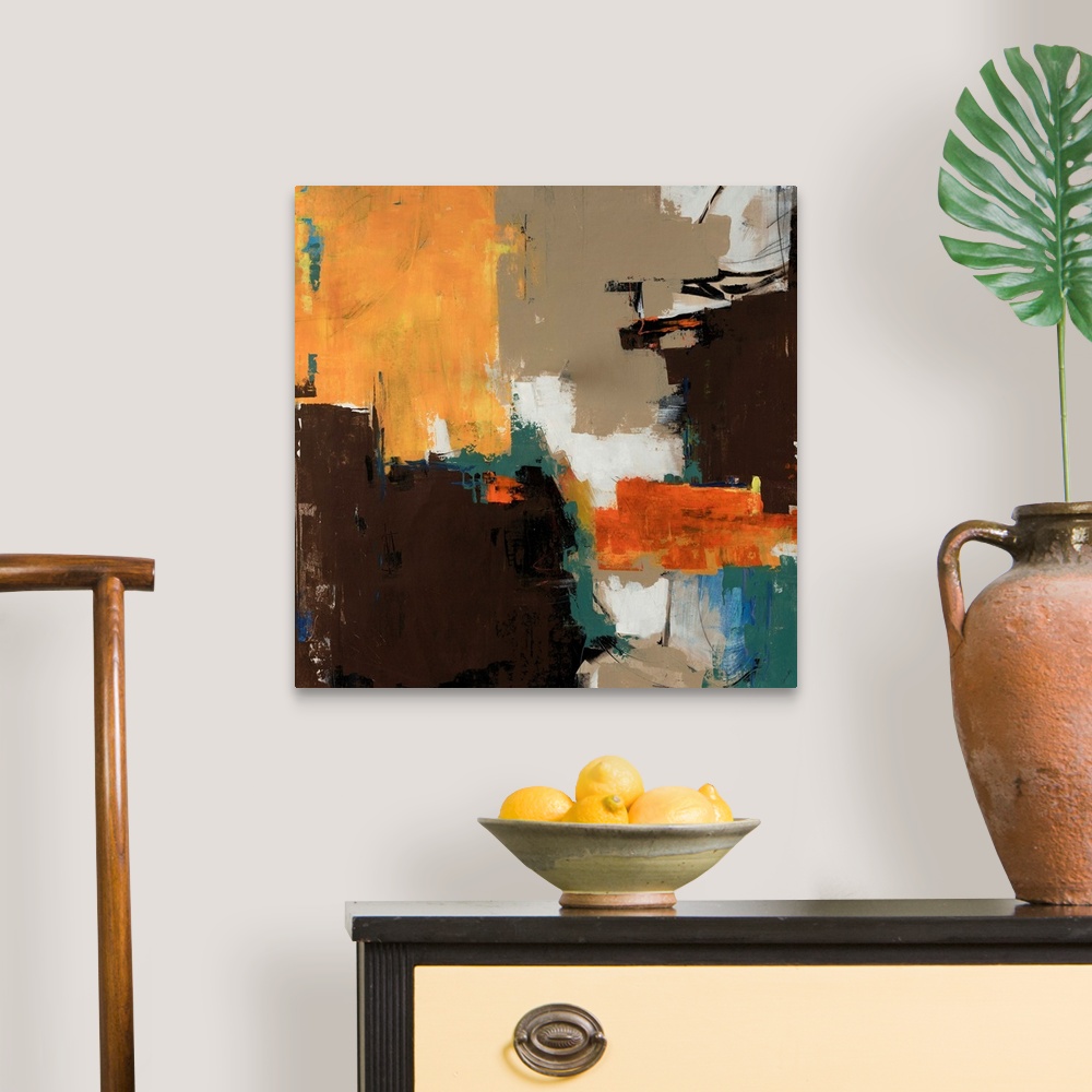 A traditional room featuring Abstractly painted image on canvas with different patches of color layered on top of each other.