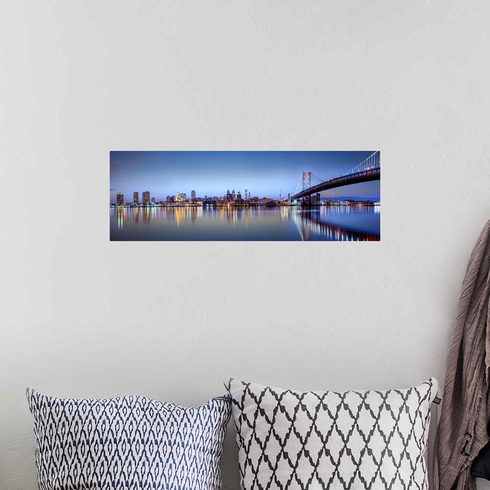 A bohemian room featuring Panoramic photo of the Philadelphia city skyline reflected in the water at night, with the Benjam...