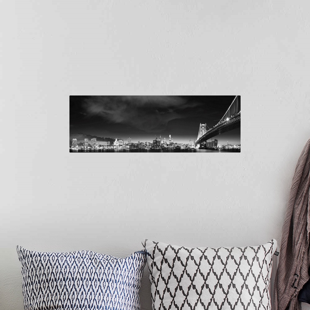 A bohemian room featuring Panoramic photo of the Philadelphia city skyline at night, with the Benjamin Franklin Bridge on t...