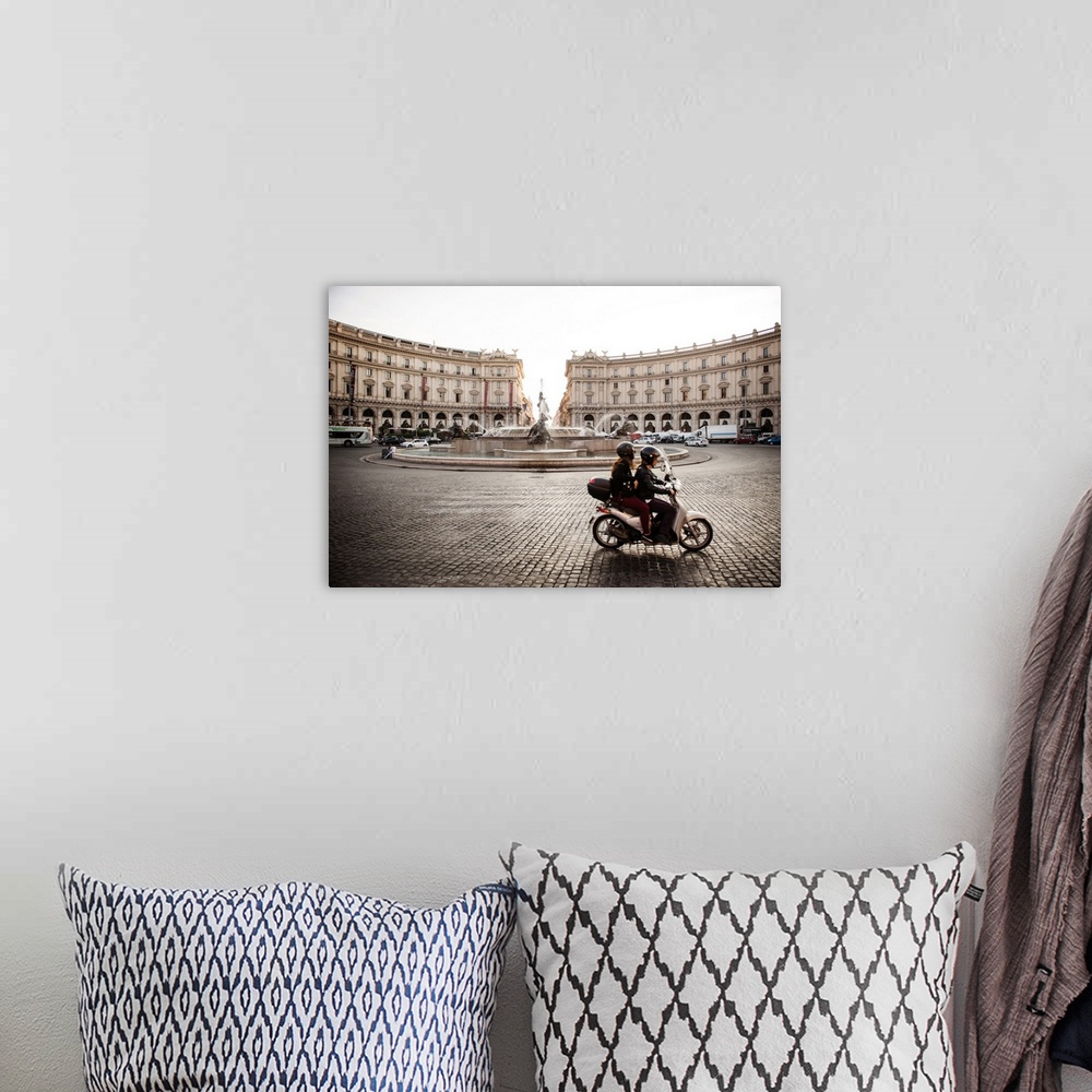 A bohemian room featuring Photograph of the Piazza della Repubblica with the Fountain Of The Naiads and a couple on a motor...
