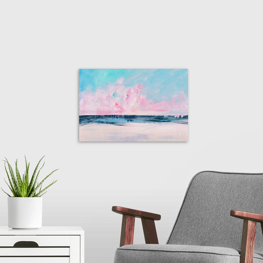A modern room featuring Semi-abstract contemporary artwork of a seascape with bright pink clouds on the horizon.