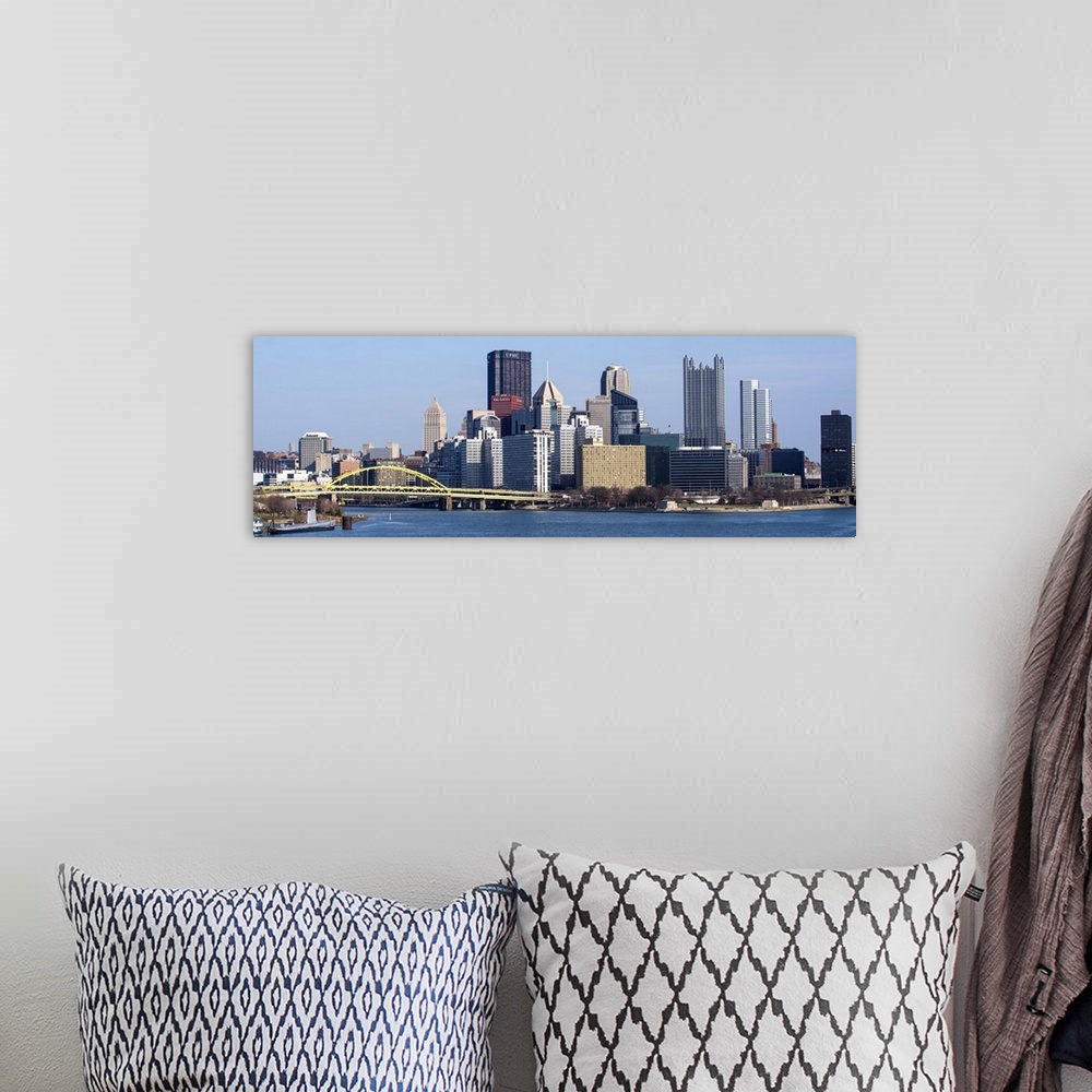 A bohemian room featuring Skyline of Pittsburgh, Pennsylvania, with the Fort Pitt Bridge leading into the city.