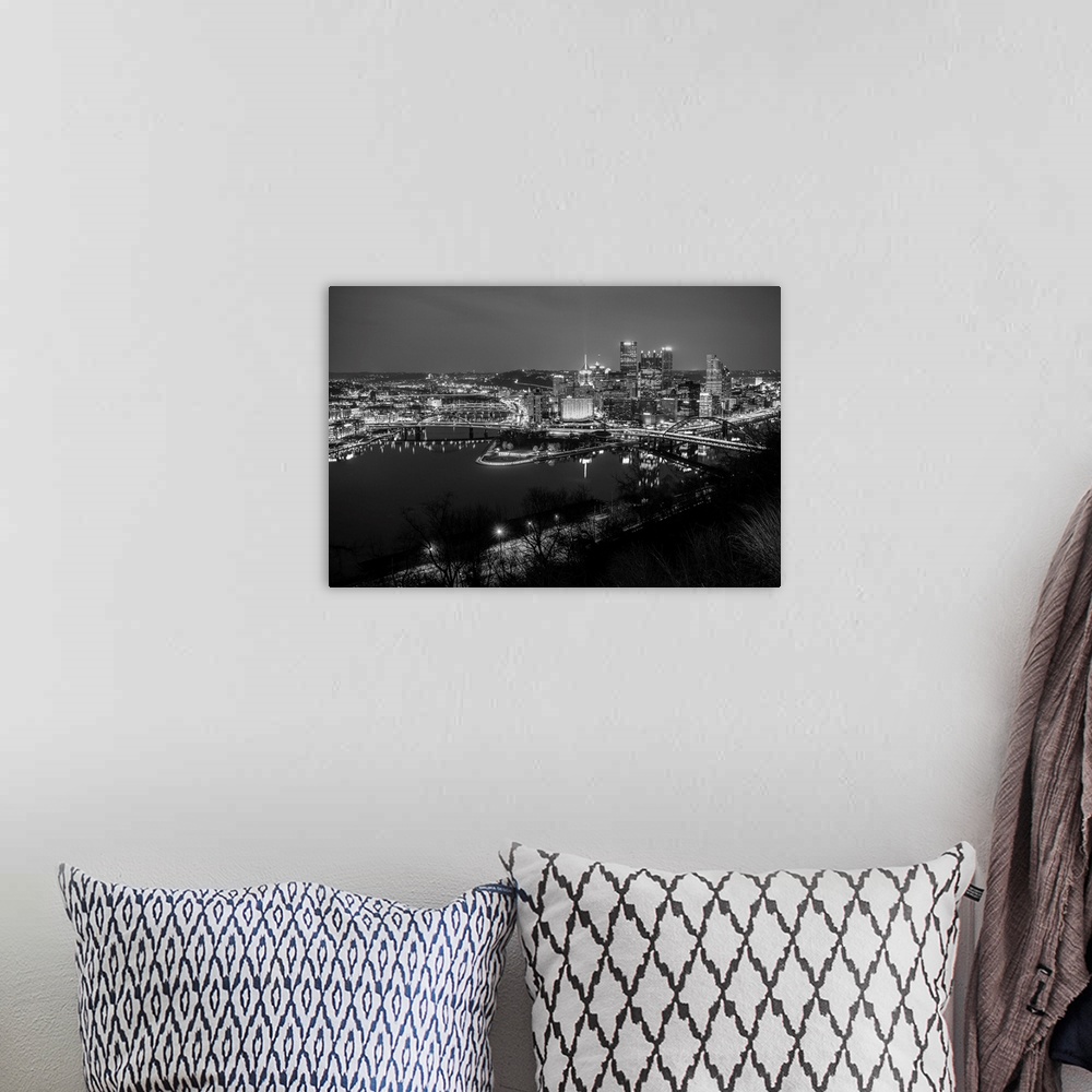 A bohemian room featuring Photo of downtown Pittsburgh at night with Point State park.