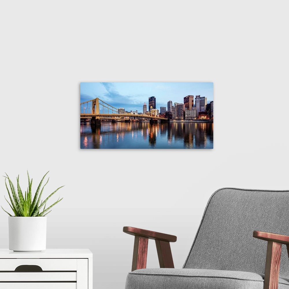 A modern room featuring View of downtown Pittsburgh with Andy Warhol Bridge over the Allegheny River.