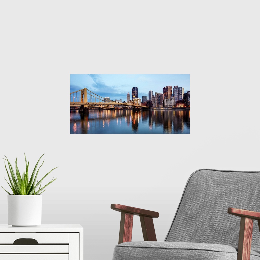 A modern room featuring View of downtown Pittsburgh with Andy Warhol Bridge over the Allegheny River.