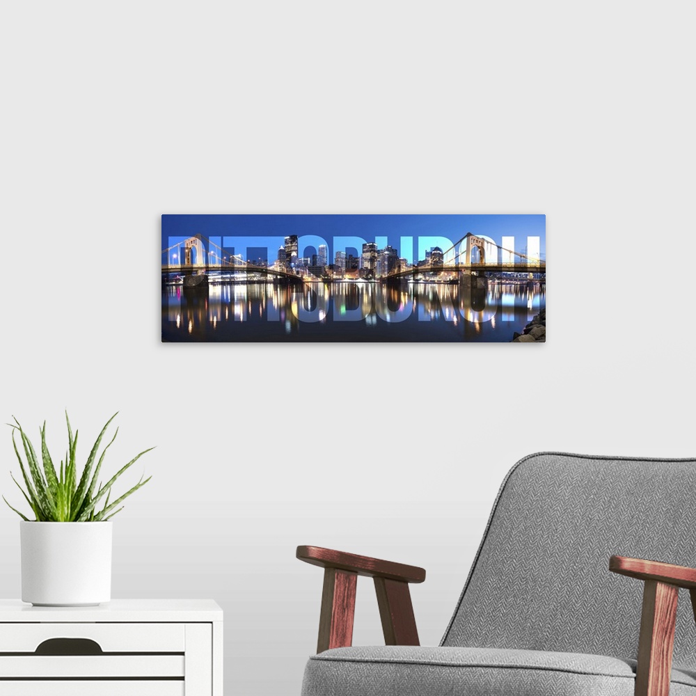 A modern room featuring Transparent typography art overlay against a photograph of the Pittsburgh city skyline.