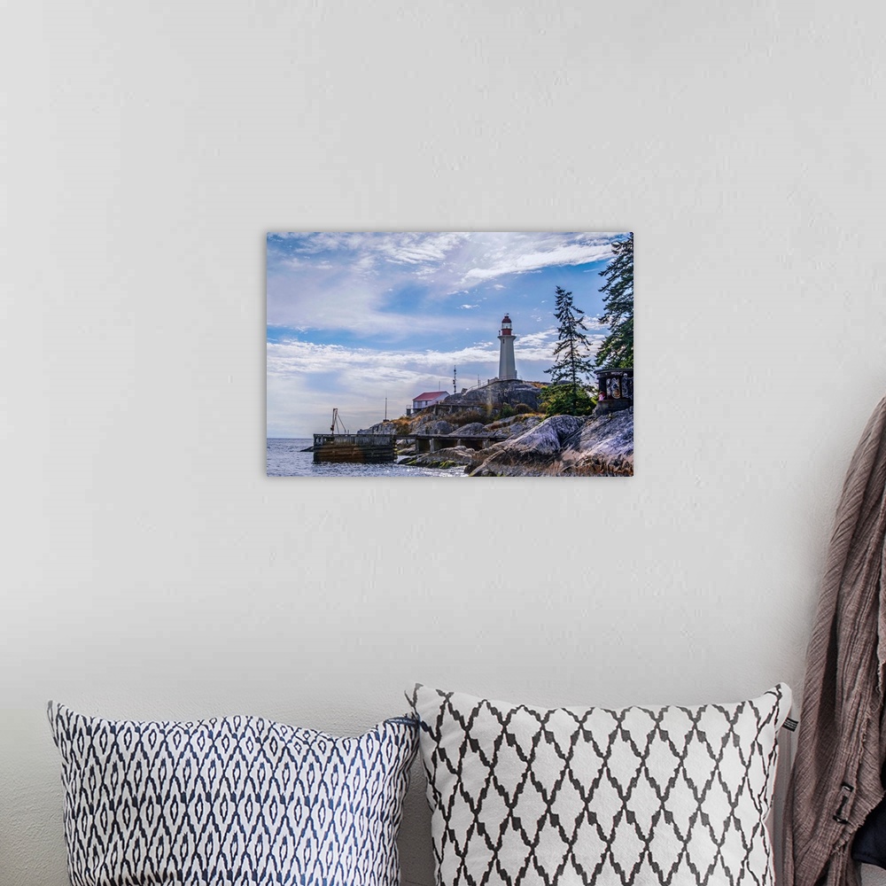 A bohemian room featuring View of Point Atkinson Lighthouse and blue skies in Vancouver, British Columbia, Canada.