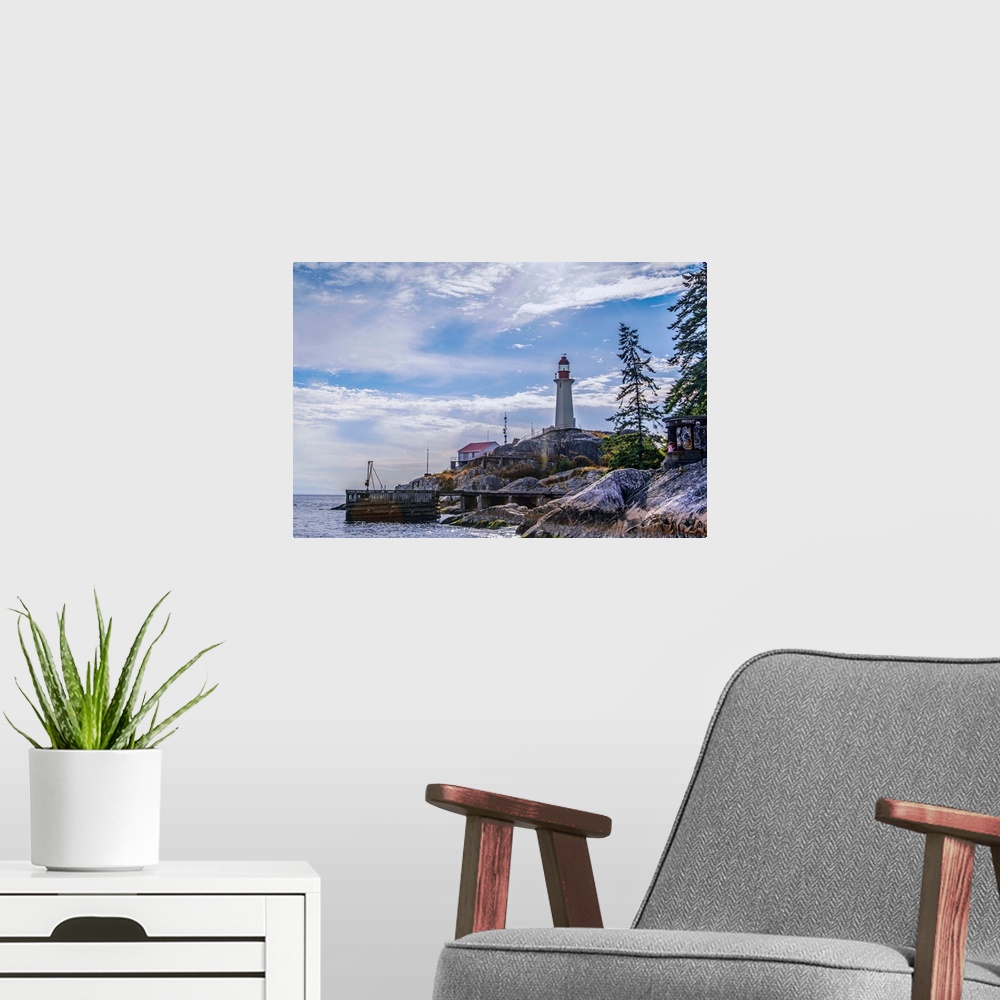 A modern room featuring View of Point Atkinson Lighthouse and blue skies in Vancouver, British Columbia, Canada.