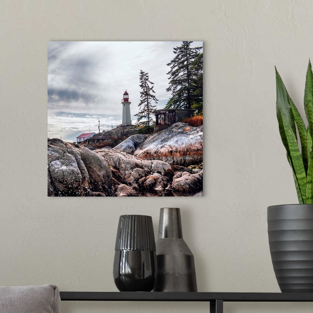 A modern room featuring View of Point Atkinson Lighthouse and rocky shore in Vancouver, British Columbia, Canada.
