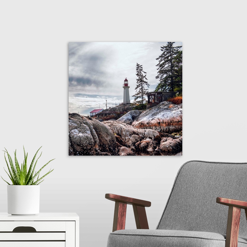 A modern room featuring View of Point Atkinson Lighthouse and rocky shore in Vancouver, British Columbia, Canada.