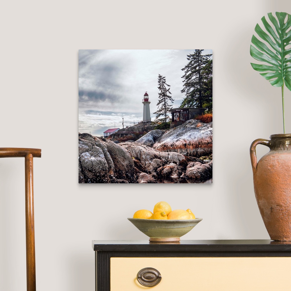 A traditional room featuring View of Point Atkinson Lighthouse and rocky shore in Vancouver, British Columbia, Canada.