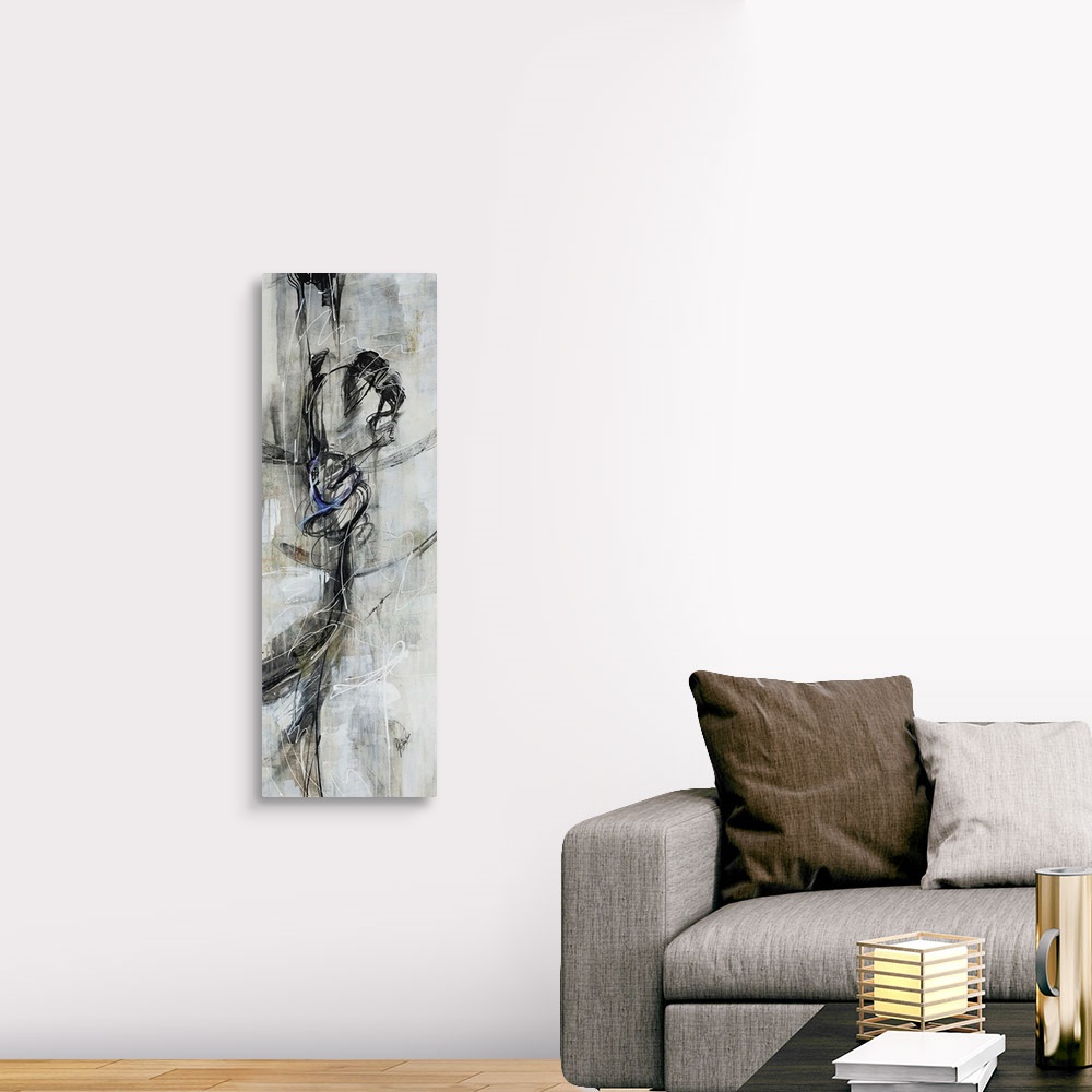 A traditional room featuring Figurative art work of a female dancer in various shades of black and gray.