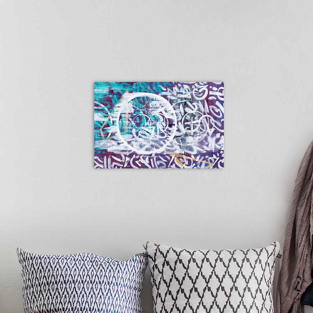 A bohemian room featuring Urban abstract painting in teal and purple covered in white symbols.