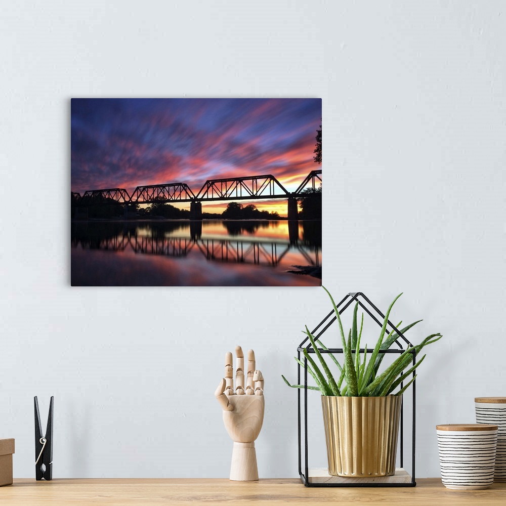 A bohemian room featuring Photograph of a bridge silhouette at sunset in Providence Metropark.