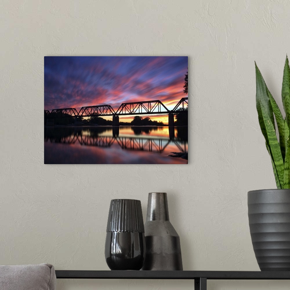 A modern room featuring Photograph of a bridge silhouette at sunset in Providence Metropark.