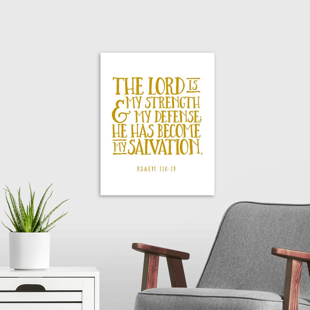 A modern room featuring Handlettered Bible verse reading The Lord is my strength and my defense; He has become my salvation.