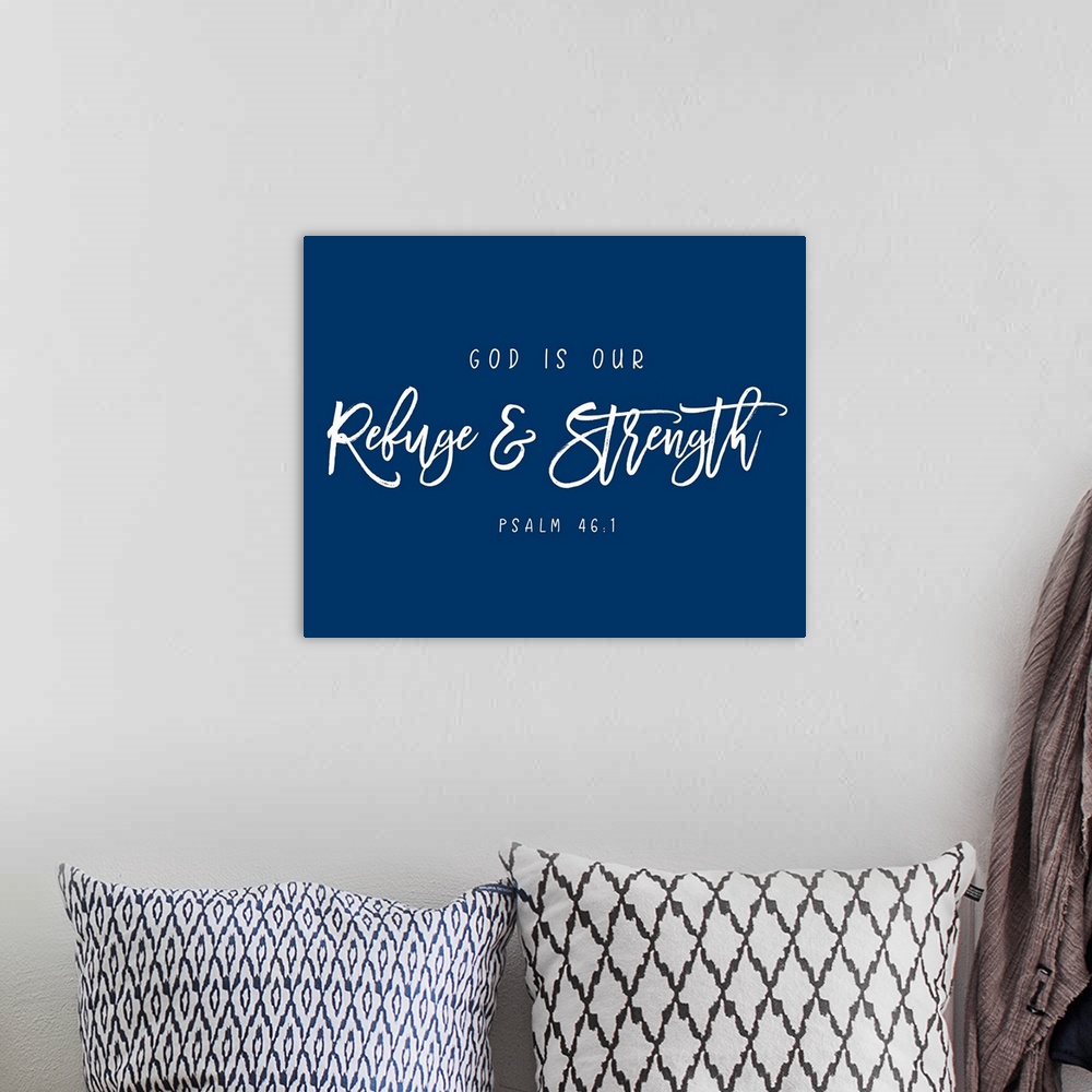 A bohemian room featuring Handlettered Bible verse reading God is our refuge and strength.
