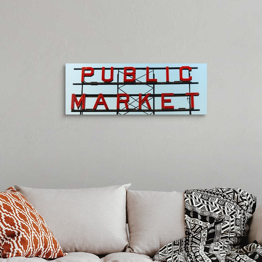 A bohemian room featuring Panoramic photograph of the Public Market sign at Pike Place Market in San Francisco.