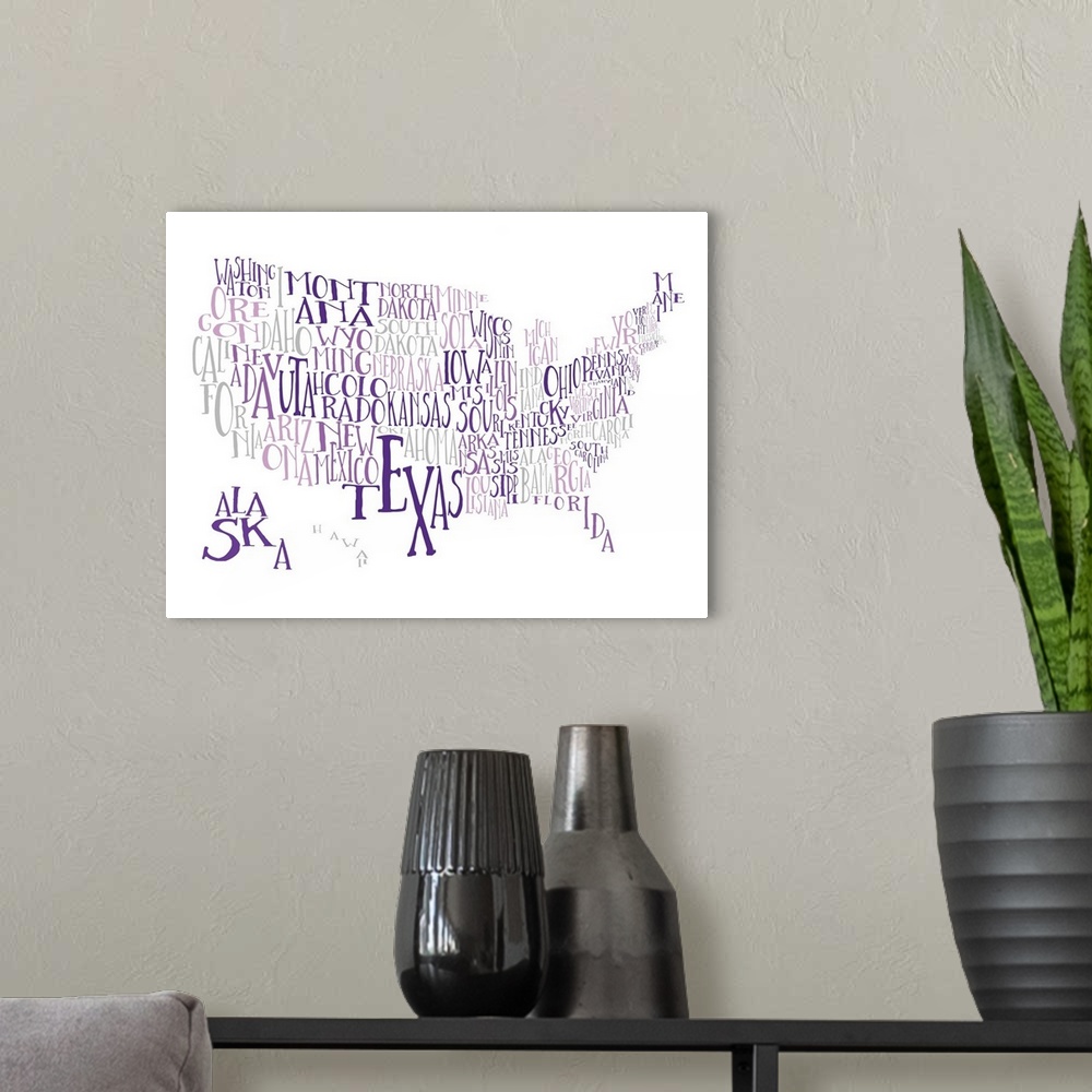 A modern room featuring A hand-drawn typography map of the United States with all the state names, in purple and grey.