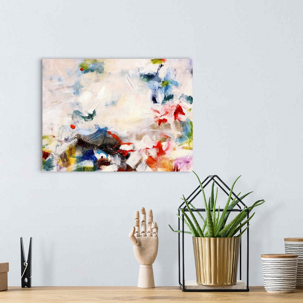 A bohemian room featuring Colorful contemporary abstract painting consisting of short thick brush strokes.