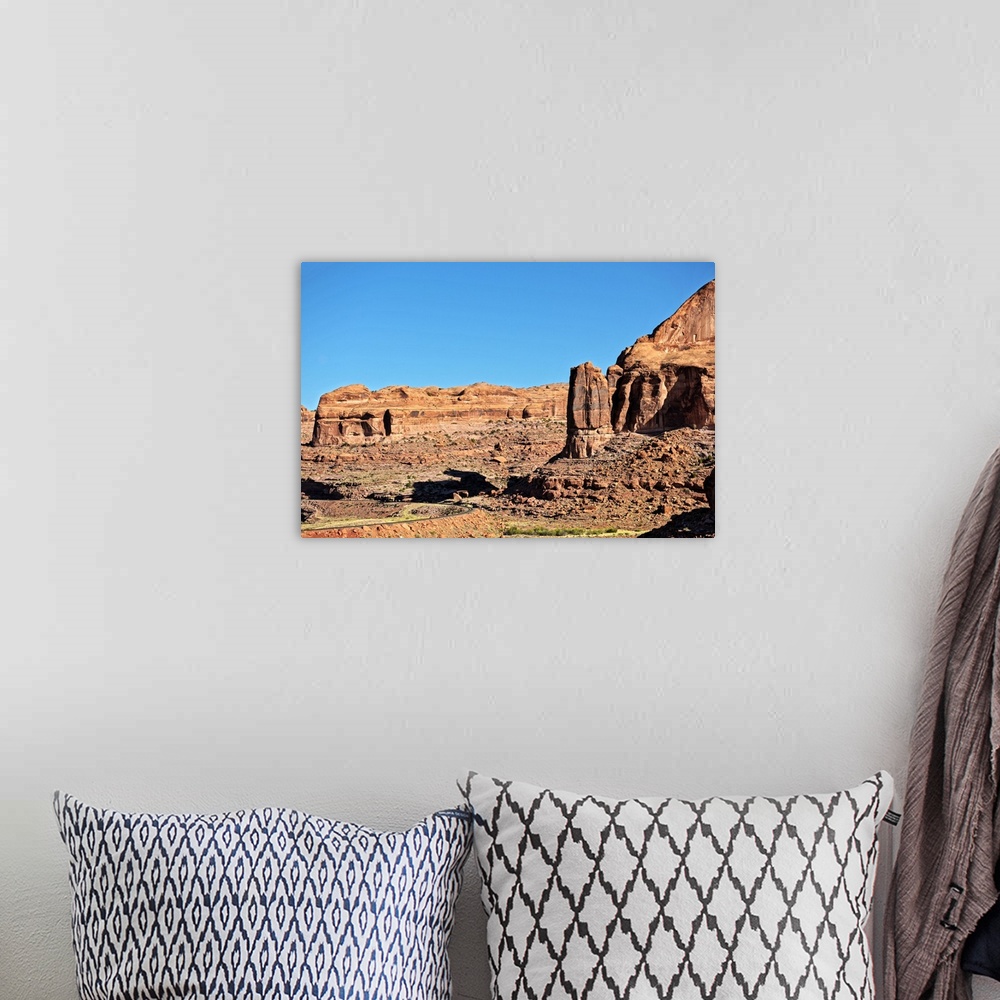 A bohemian room featuring Red Rock cliffs made of eroded sandstone in the desert landscape of Arches National Park, Moab, U...