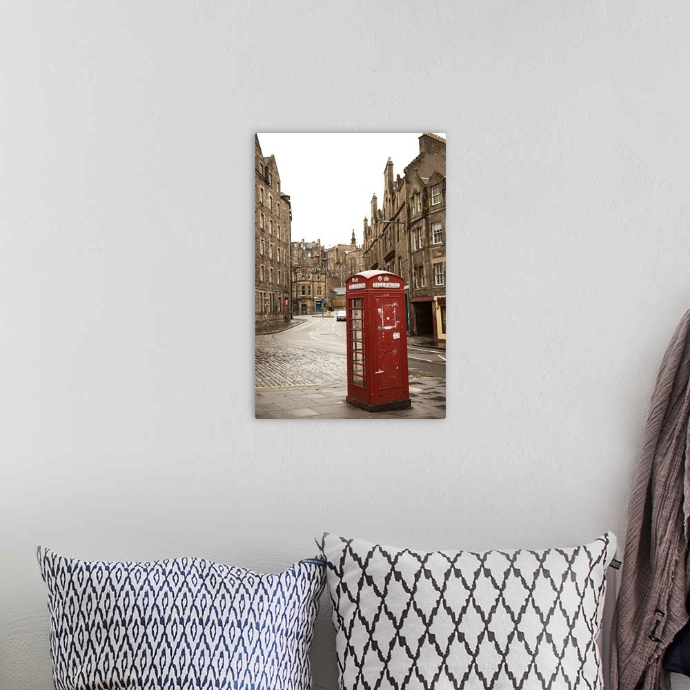 A bohemian room featuring Photograph of a red telephone booth on a street corner in Edinburgh, surrounded by beautiful arch...