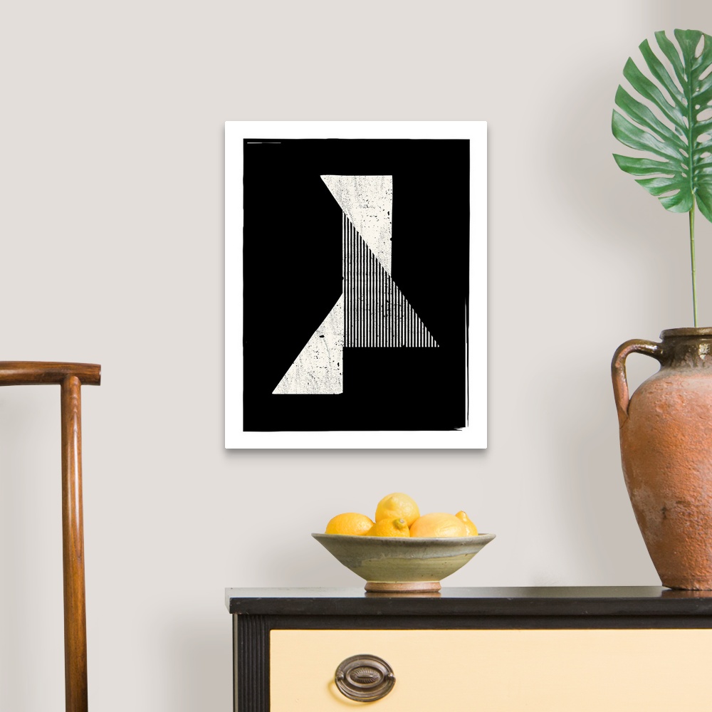 A traditional room featuring A simple, geometric, triangular design in a monochrome color scheme.