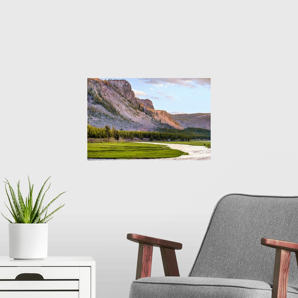 A modern room featuring River flowing along the mountains in Yellowstone National Park in Wyoming.