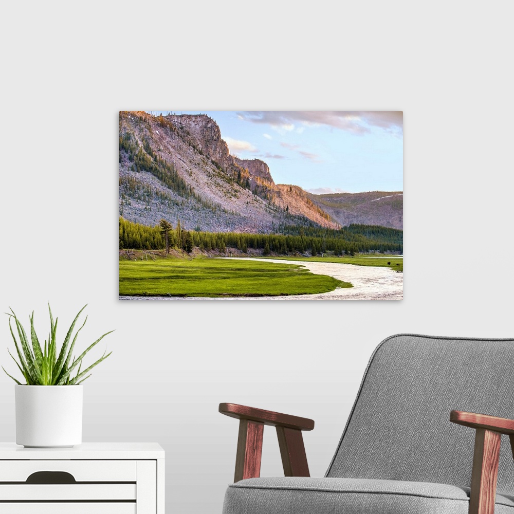 A modern room featuring River flowing along the mountains in Yellowstone National Park in Wyoming.