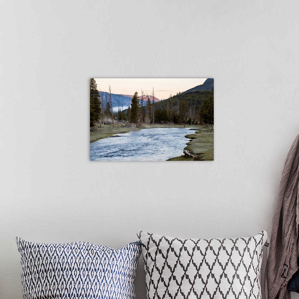 A bohemian room featuring River flowing along the mountains in Yellowstone National Park in Wyoming.